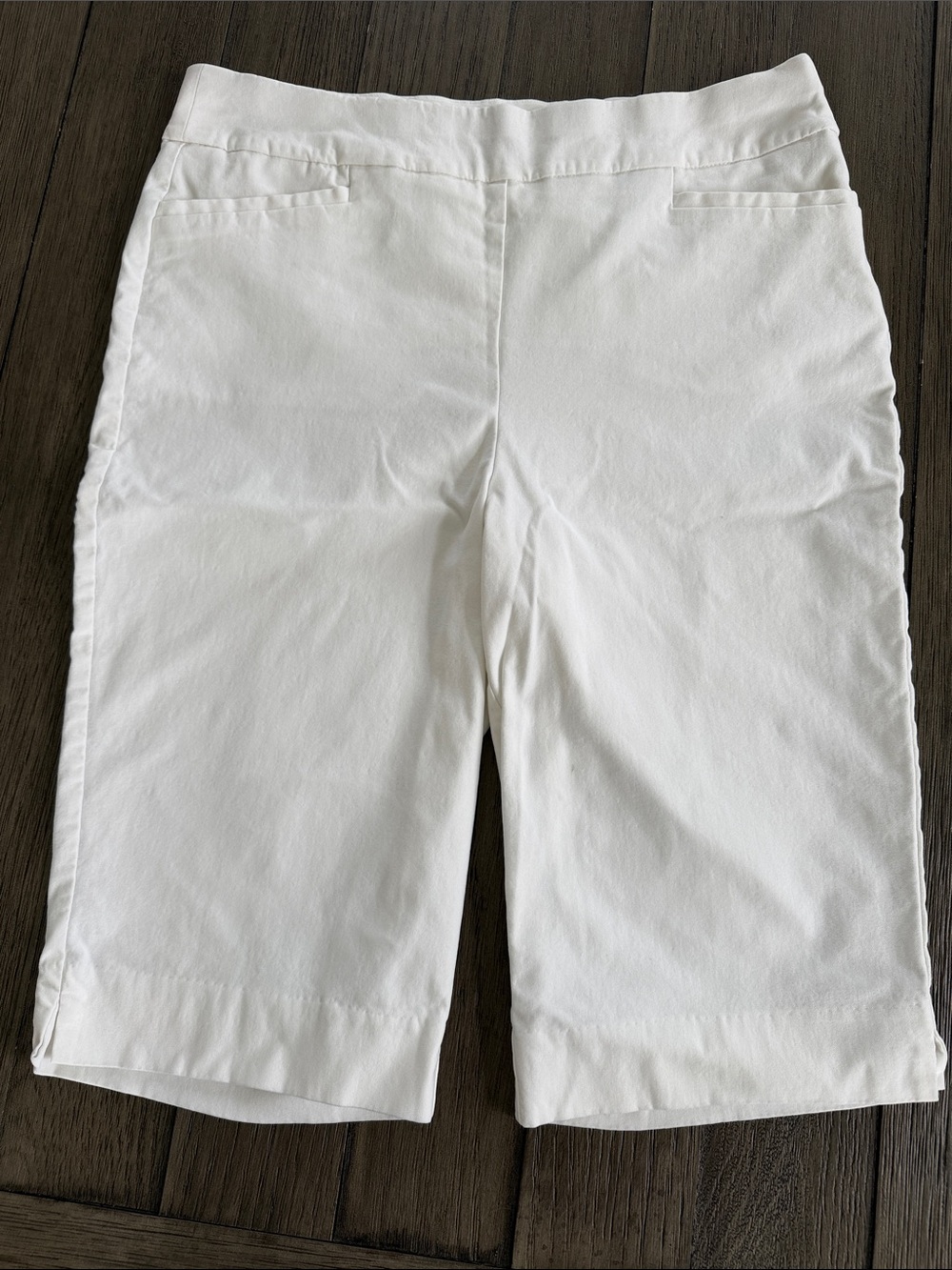 5/$20 Chico's crisp white pull-on Bermuda shorts, size 1, with front pockets.